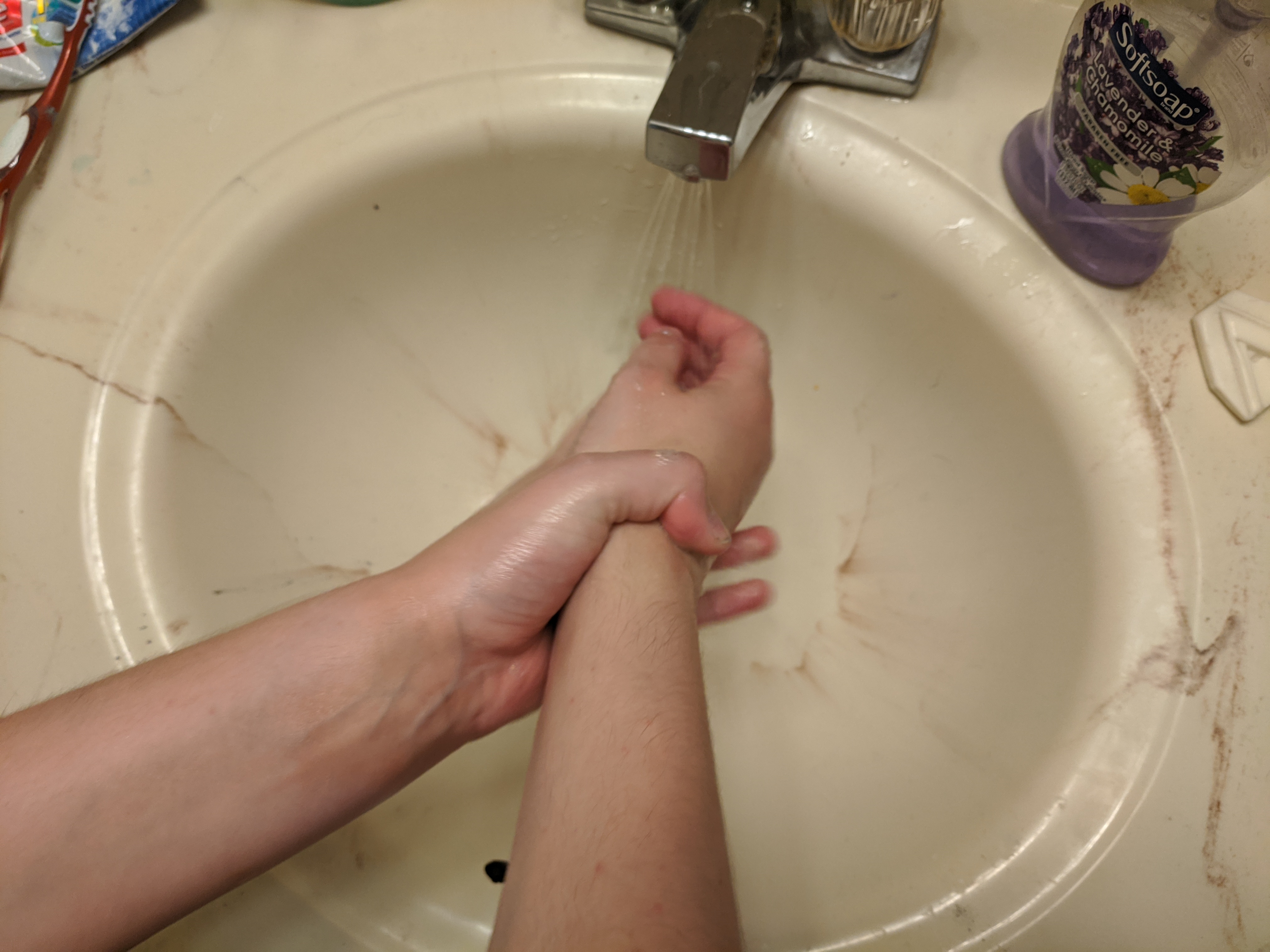 left hand washing right wrist